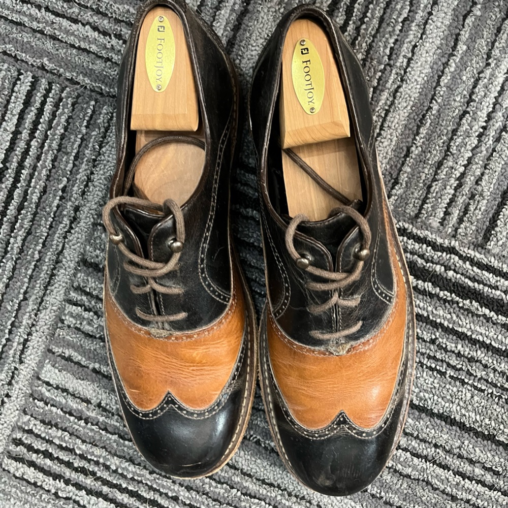 Two-tone 11.5 Wolverine 1000 mile wingtips excellent used condition. Very unique
